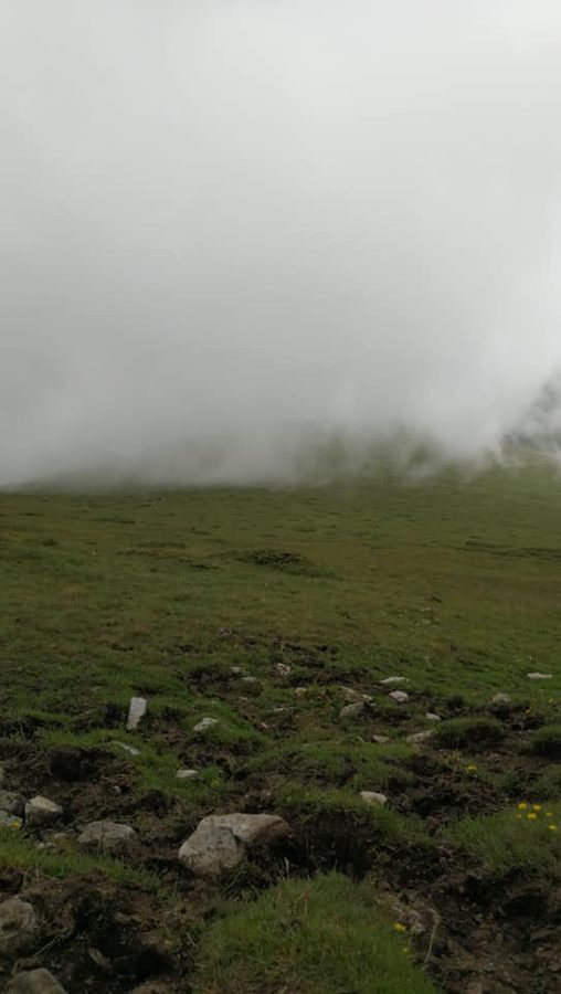 The fog rolling over the ridge